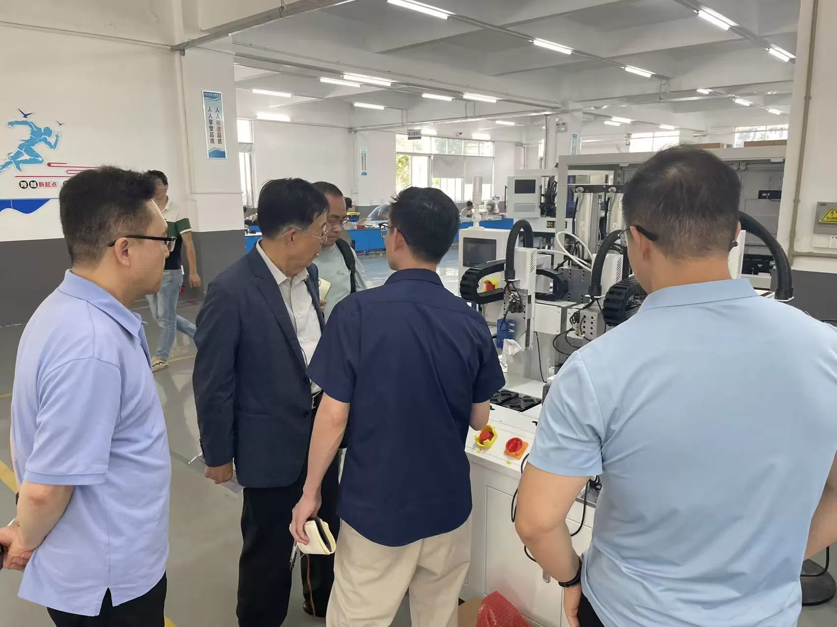 Korean customer visits Morewell factory to inspect automatic screwdriver goods.