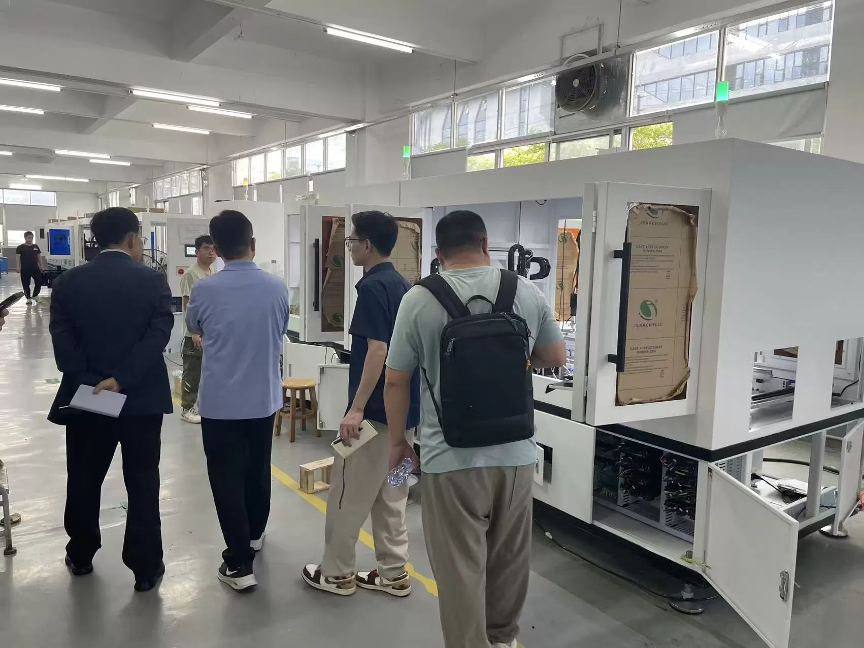 Korean customer visits Morewell factory to inspect automatic screwdriver goods.