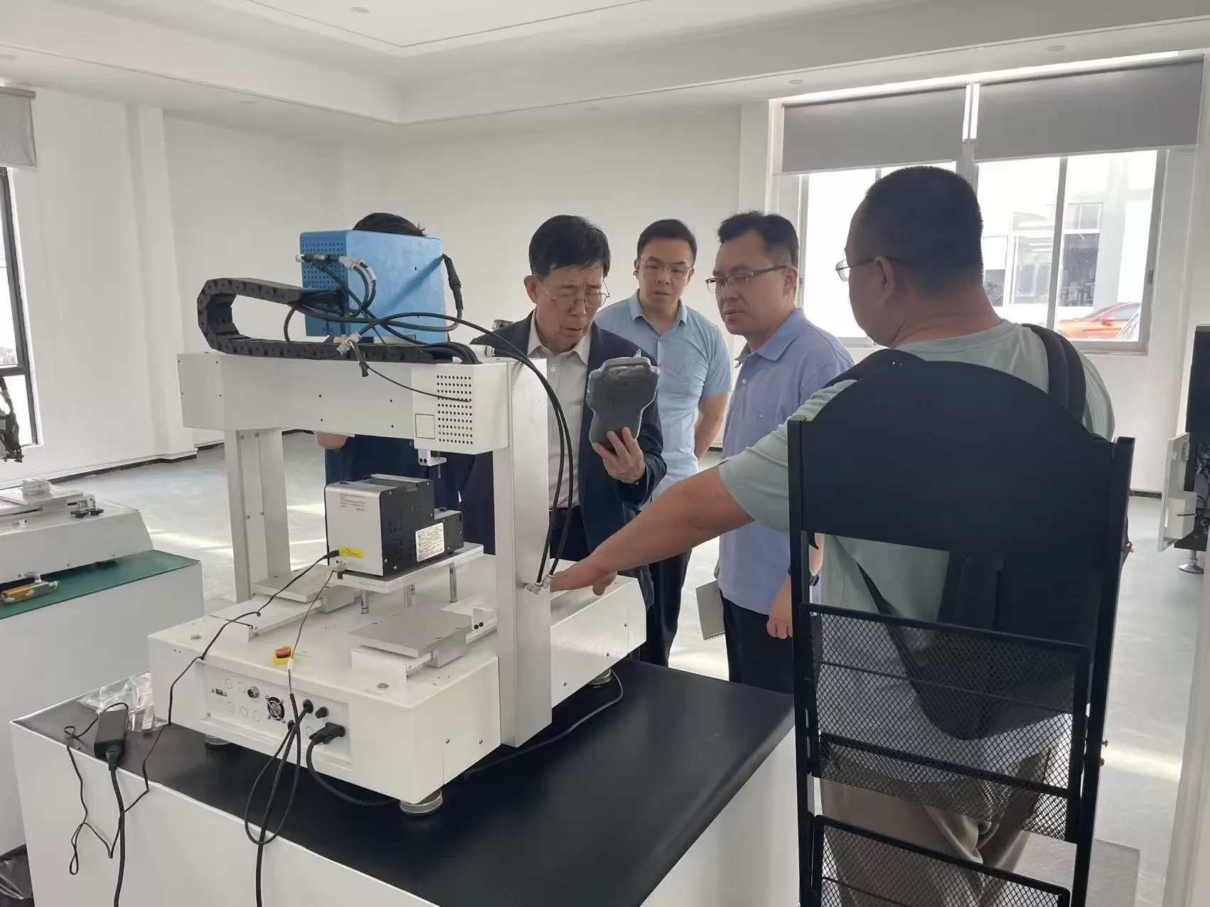 Korean customer visits Morewell factory to inspect automatic screwdriver goods.